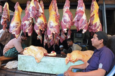 Indian Muslim butchers sell beef during