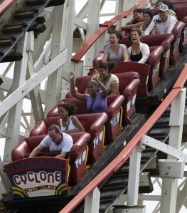 Riders on the Cyclone rollercoaster at A