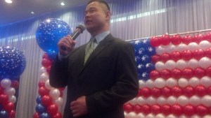 John Liu addresses the crowd.