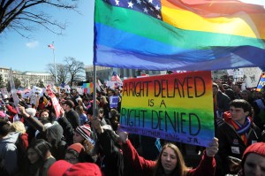 Same-sex marriage supporters shout slogans in front of the US Supreme Court. (Photo: Getty)