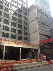 Kaufman's not-awful hotel still exposes the naked lot line wall of its newly-built neighbor.