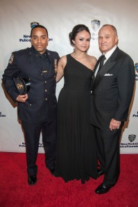 Detective Ivan Marcano, Hilda Miolan and Police Commissioner Ray Kelly.