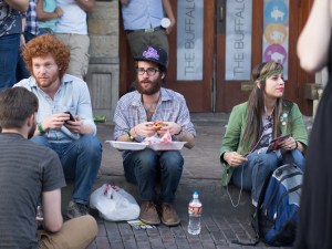 Young Hipsters eat street food during SXSW 2013