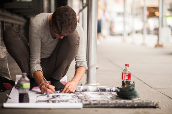 The mysterious artist appeared one day and started painting. (credit: Amanda Cohen)