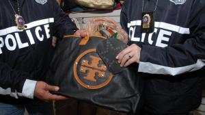 A counterfeit Tory Burch bagged seized by NYPD, featuring the brand's oft-mimicked logo. (NYPD)