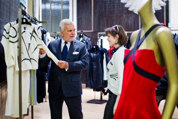 Mr. Schaefer explains the concept of luxury retail. Notice my stylish cat sweater.