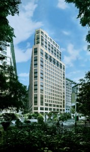 A rendering of the building with its roof-top addition, where the penthouse "tower residences" will be located.