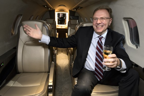 The president of the business jet unit of Canadian manufacturer Bombardier, Steven Ridolfi, poses inside a model of the new Learjet 75 that was unveiled at the European Business Aviation Convention and Exhibition (EBACE) in Geneva.