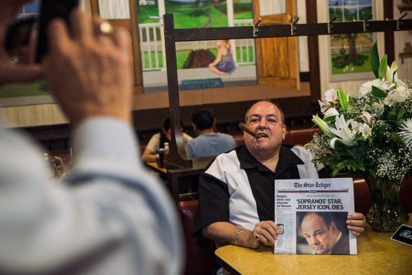 James GandolDonald Metzger, a James Gandolfini and Tony Soprano impersonator, poses for photos at the booth where the final scene of the final episode of the HBO show, "The Sopranos," was filmed, at Holsten's restaurant in New Jersey. (Getty)