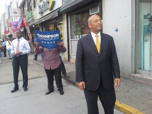 Bill Thompson greets people outside of the Flatbush Avenue-Brooklyn College subway station.