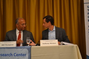 Bill Thompson and Anthony Weiner chatting at the forum.