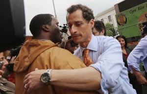Anthony Weiner hugs a man in Harlem during his campaign kick-off. (Photo: Mario Tama/Getty Images) 