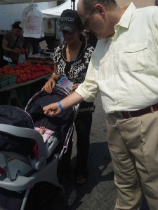 Republican Joe Lhota high fives a baby today. 