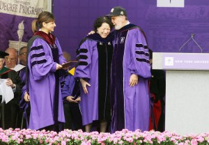 Justice Sonia Sotomayor, center, is hugged by John Sexton as Maria Bartiromo looks on. (Photo by Mario Tama/Getty Images)