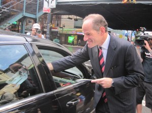 Eliot Spitzer stopping traffic this morning in Queens.