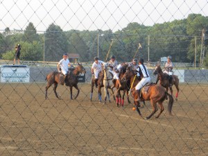 Players compete at the U.S. Open Arena Polo Championship in Medford, N.Y.