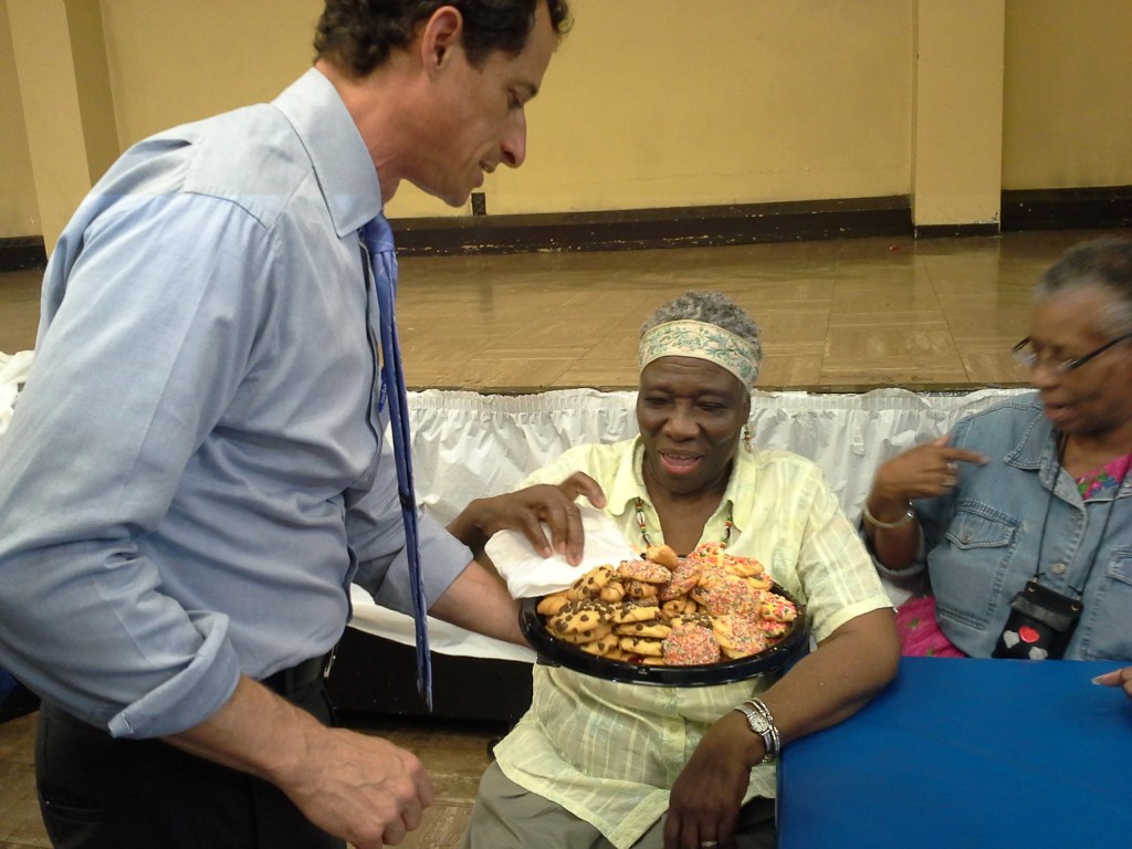 Anthony Weiner totes around a plate of cookies in Brownsville today.