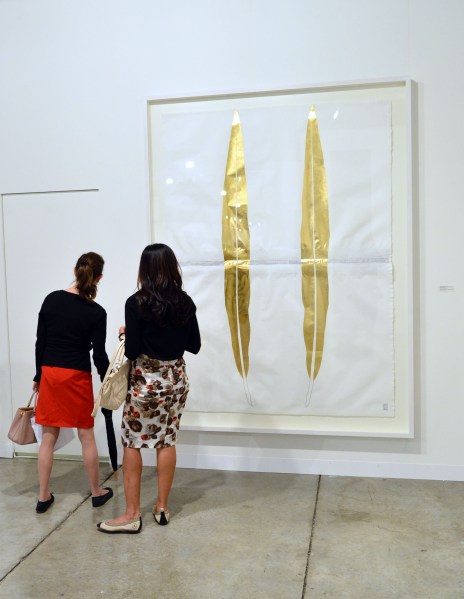 Gold goes with everything, especially at Art Basel. (Photo: Getty) 