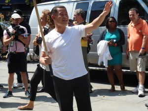 John Liu playing stickball during the mayoral campaign.