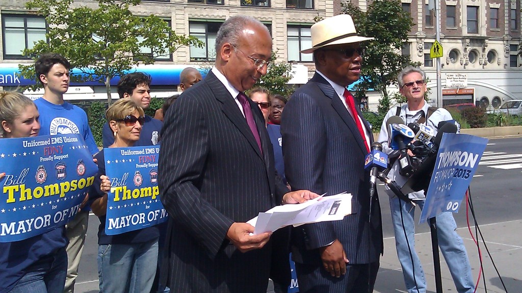 Uniformed EMS Officers Union stand behind mayoral candidate Bill Thompson during today's event.