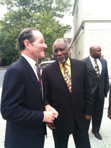 Eliot Spitzer speaking with Rev. Youngblood