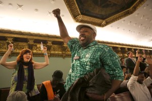 Stop-and-frisk critics celebrate after the City Council voted to override vetoes. (Photo: Getty)