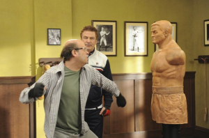 Mr. Adsit, as Pete Hornberger, gets physical in a scene with Alec Baldwin's Jack Donaghy. (NBC)