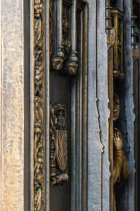 The ornate doors bear bronze castings of saints. (Fernando Gomes)
