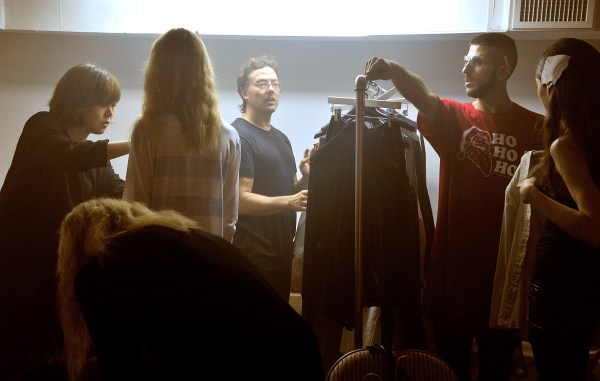 J. Crew alumnus Tim Hamilton backstage during a fashion show.