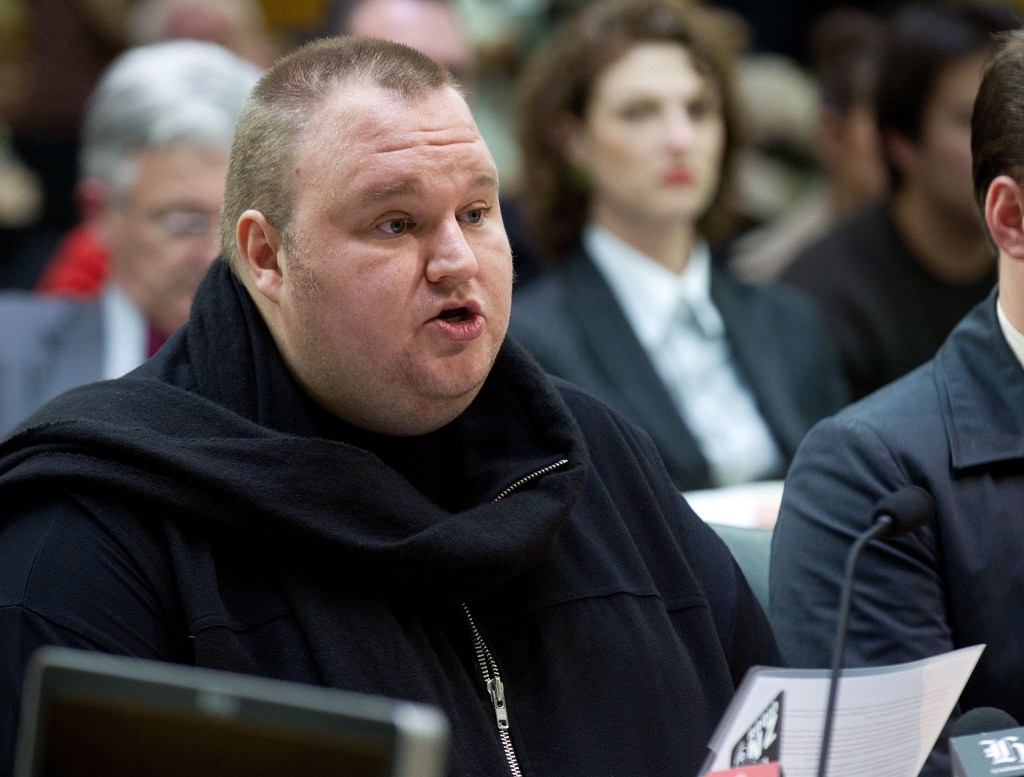 "Senator Dotcom, could you PLEASE stop grandstanding?" (Photo credit should read Marty Melville/AFP/Getty Images) 
