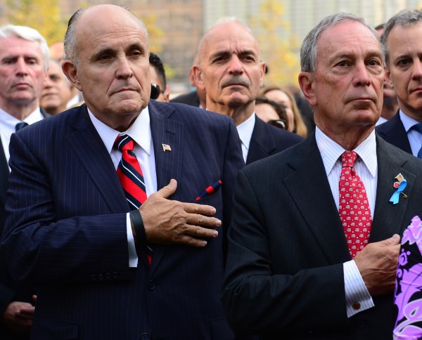 Former New York mayor Rudy Giuliani alongside outgoing New York mayor Michael Bloomberg. (David Handschuh/New York Daily News/POOL)