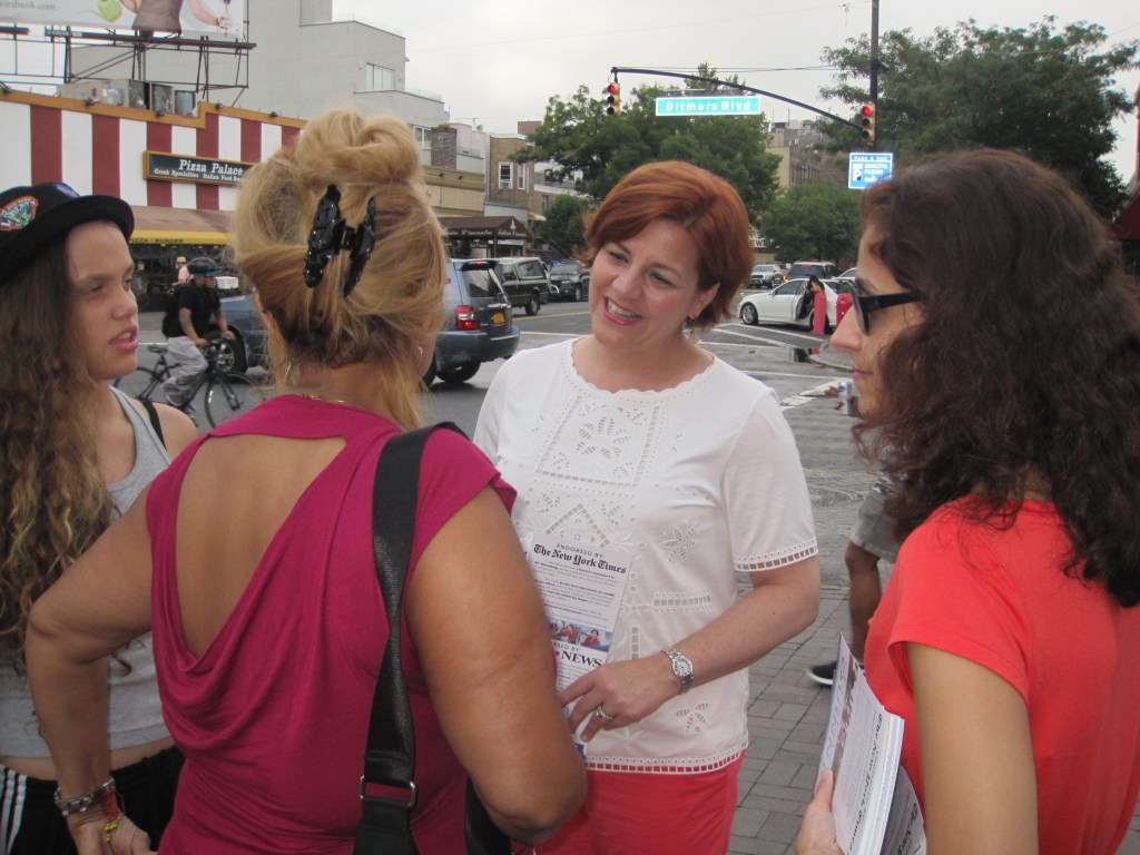Christine Quinn chatting with voters in Astoria yesterday evening.