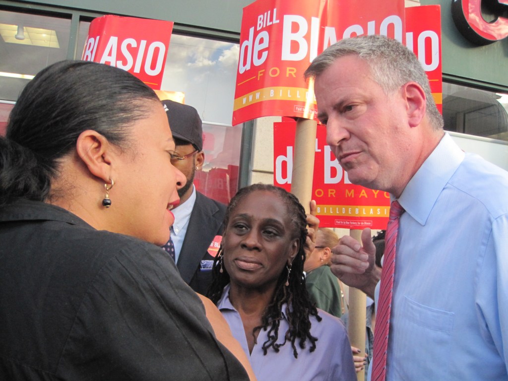 Bill de Blasio speaking to a voter in Harlem this evening.