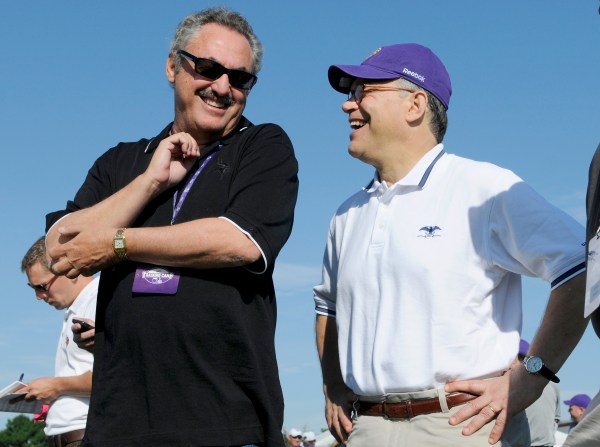 The Wilf family has donated generously to Minnesota politcians. Here, U.S. Sen. Al Franken visits the Vikings at training camp in 2011. (Photo by Hannah Foslien/Getty Images)