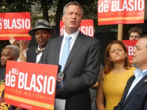 Melissa Mark-Viverito (right) and Luis Sepulveda (far right) stand with Bill de Blasio at an August press conference.
