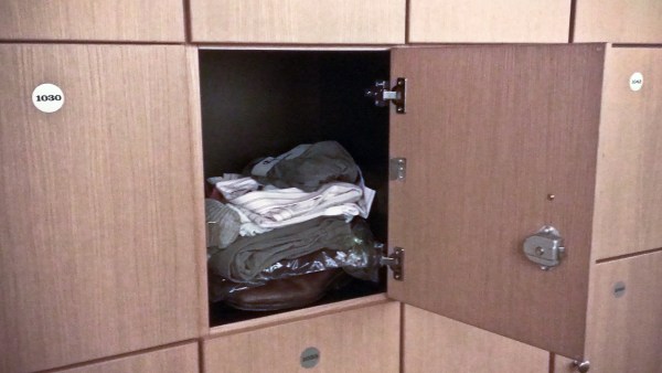 One of nine cubbies—this one he calls the “closet”—Felix rents to store his personal belongings. 