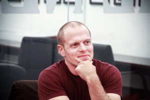 Tim Ferriss watches the premiere of his new show at The Observer offices. (Amanda Lea Perez)