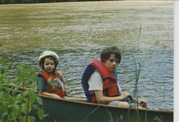 The author and his brother having an absolutely thrilling time in a canoe.