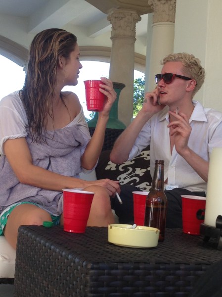 Barron Hilton, right, with a friend a fresh pair of shades, after the alleged attack.