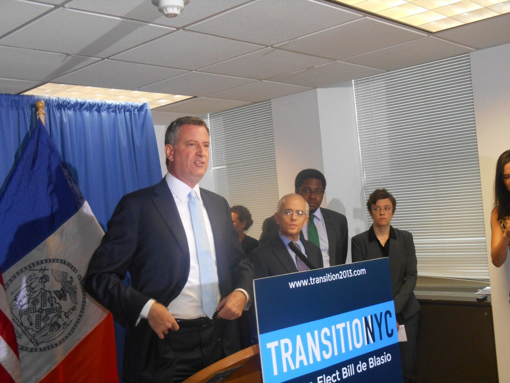 Bill de Blasio with his new high-ranking staffers, Anthony Shorris, Dominic Williams and Emma Wolfe.