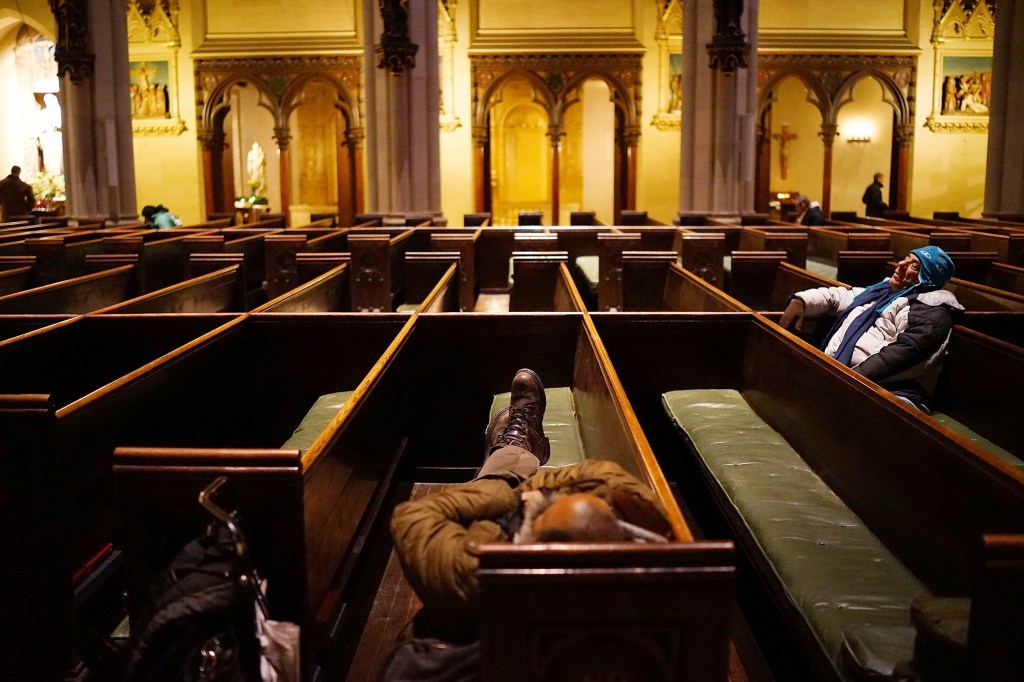 Homeless take refuge fromt he cold at a Times Square church earlier this year. (Photo: Spencer Platt/Getty)