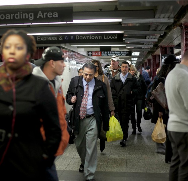 Commuters at Penn Station. (Photo by Allison Joyce/Getty Images)