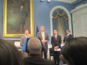 Bill de Blasio announcing his latest round of appointments at his first City Hall press conference.