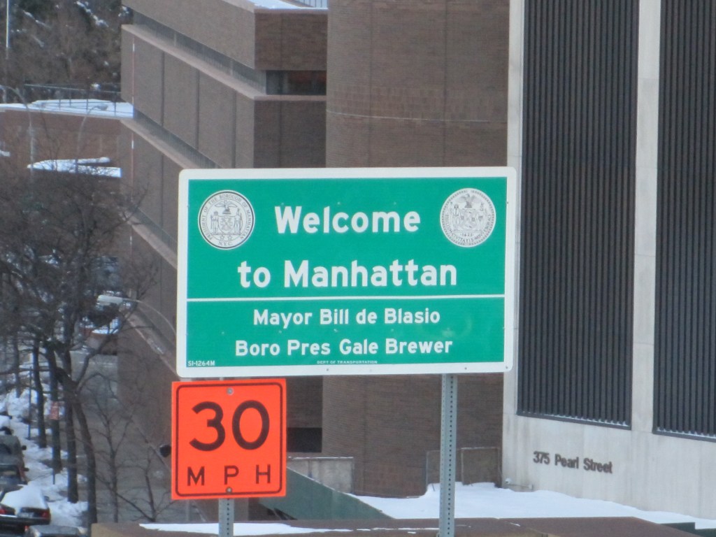 A new "Welcome to Manhattan" sign.