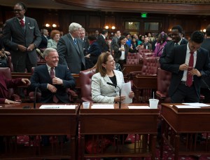 Melissa Mark-Viverito and colleagues in the City Council chambers. (Photo: William Alatriste/NYC Council)