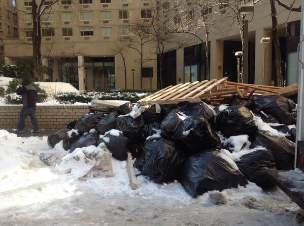 The piles might just be equal parts snow and trash (twitter).