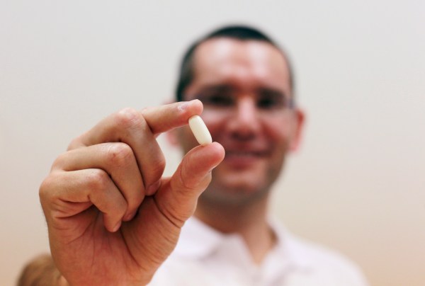 Nadav Kidron, the C.E.O. of Oramed, with an insulin pill. (Photo via Baz Ratner/Reuters)