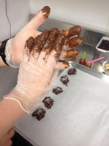 Love at first chocolate making class! Here's a totally not staged photo of us holding hands with chocolate-covered gloves.