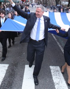 Bill de Blasio marches in a parade yesterday. (Photo: Rob Bennett/NYC Mayor's Office)