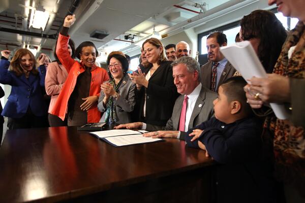 Mayor Bill de Blasio signing his first bill into law today. (Photo: Twitter/@BilldeBlasio)
